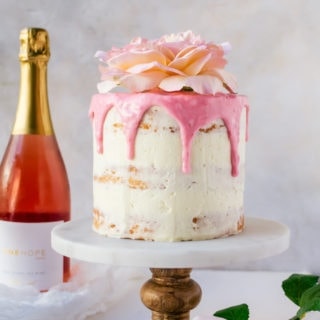 Showstopping raspberry rose cake made with sparkling rose win