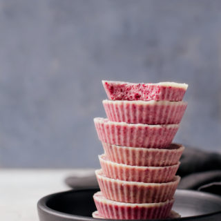 Guilt free candy time with these keto-friendly white chocolate raspberry cups! #keto #raspberry #whitechocolate