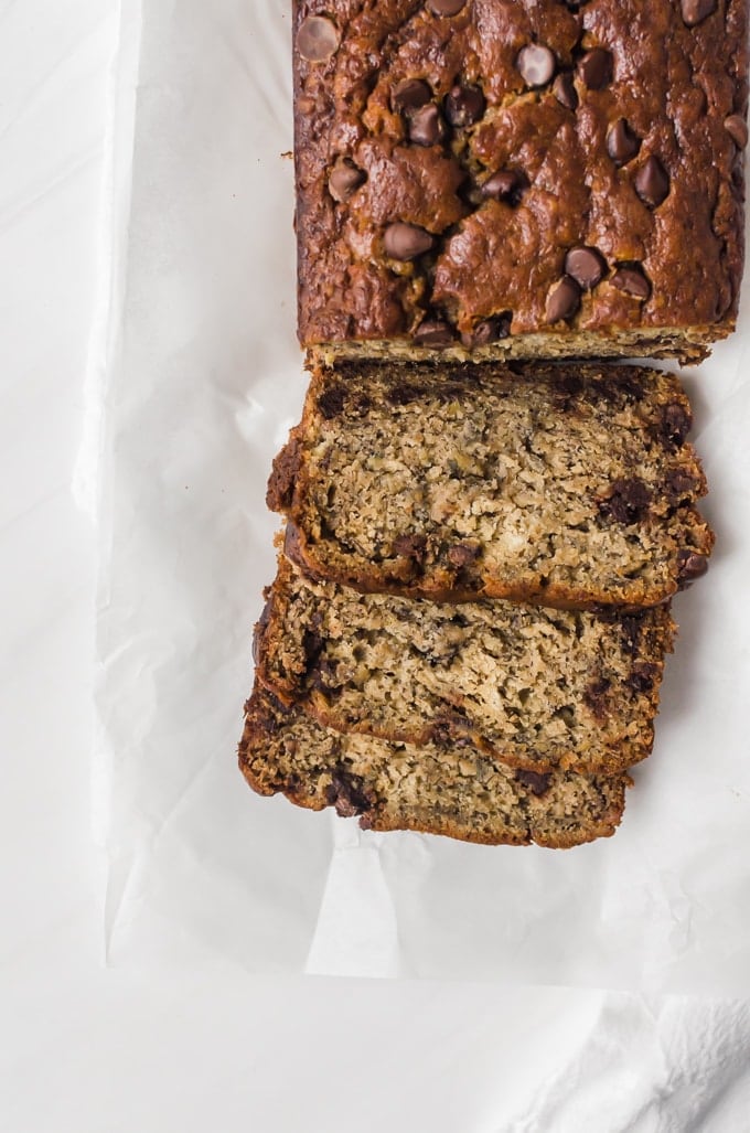 Overhead shot, slices of brown butter banana bread and loaf