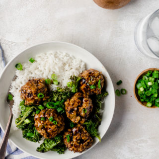 Overhead shot of Tsukune Japanese Chicken Meatballs with coconut rice and kale in a bowl