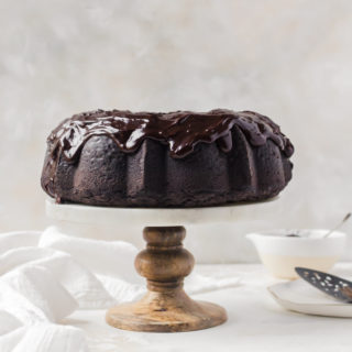 Chocolate stout bundt cake on a cake stand