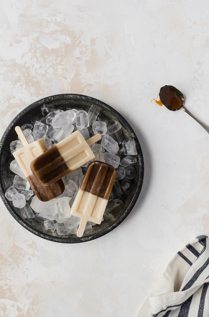 overhead shot caramel macchiato popicles on ice