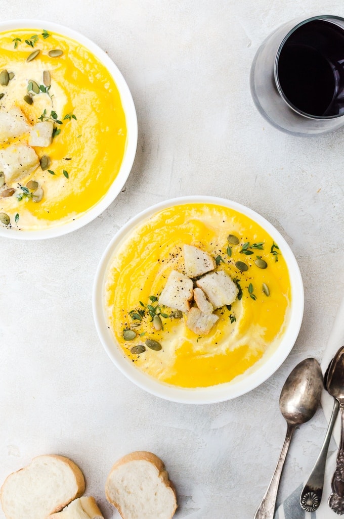 two bowls of roasted butternut squash soup 