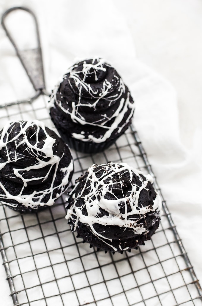 three quarter shot spider web cupcakes