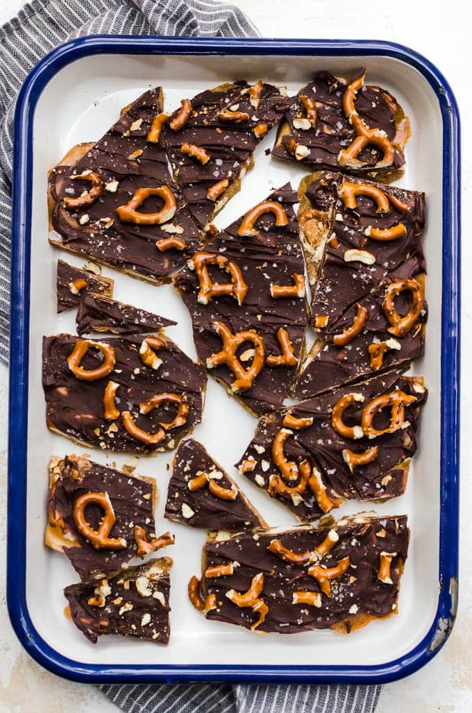 Pretzel toffee bark broken in pieces in pan