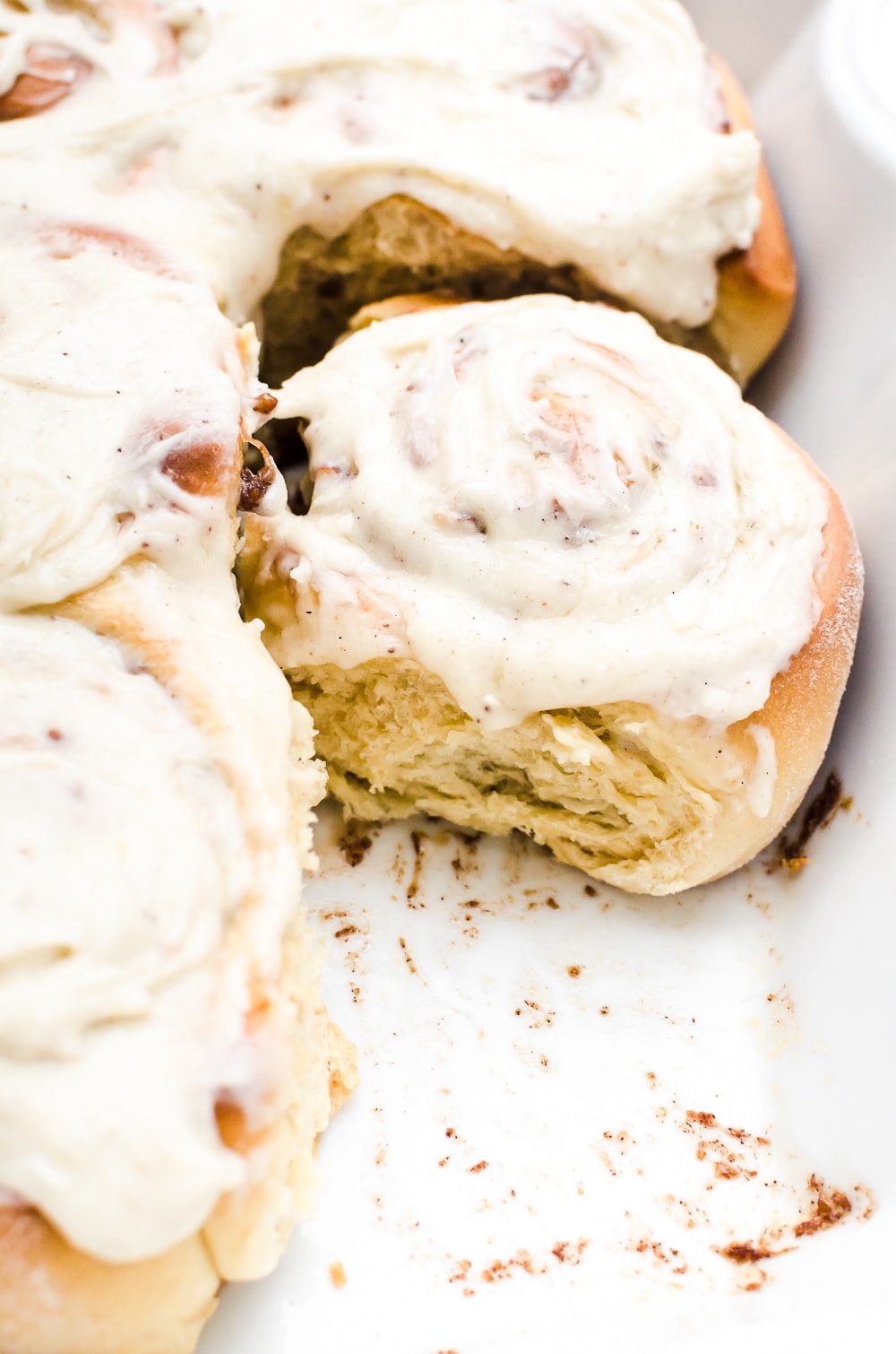 close up banana cinnamon roll in pan