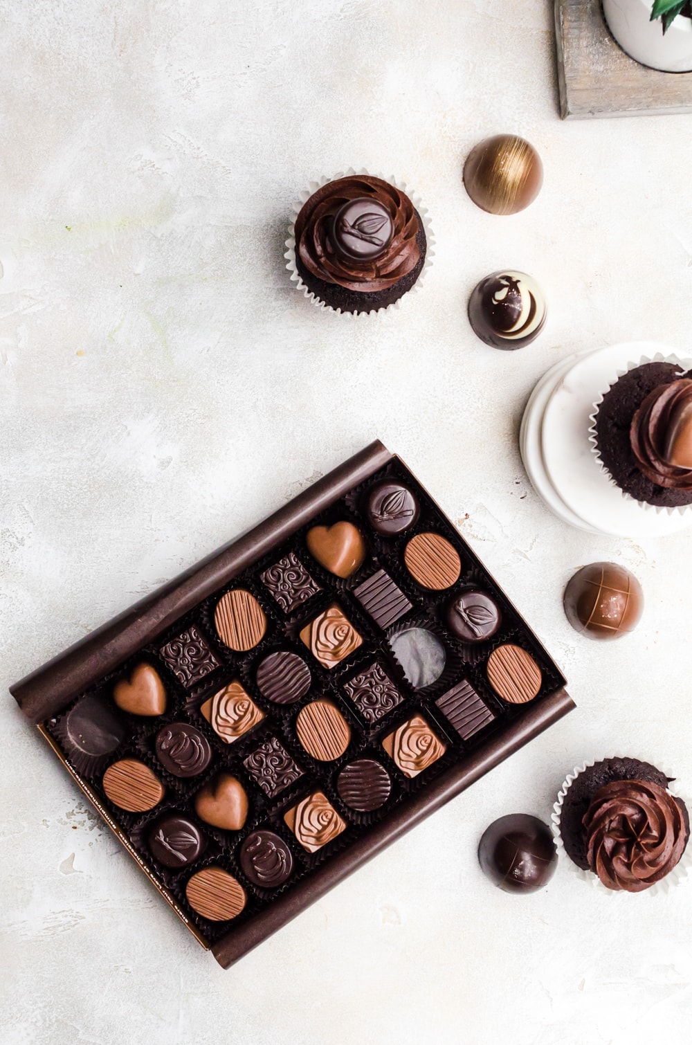 assorted simply chocolate with cupcakes