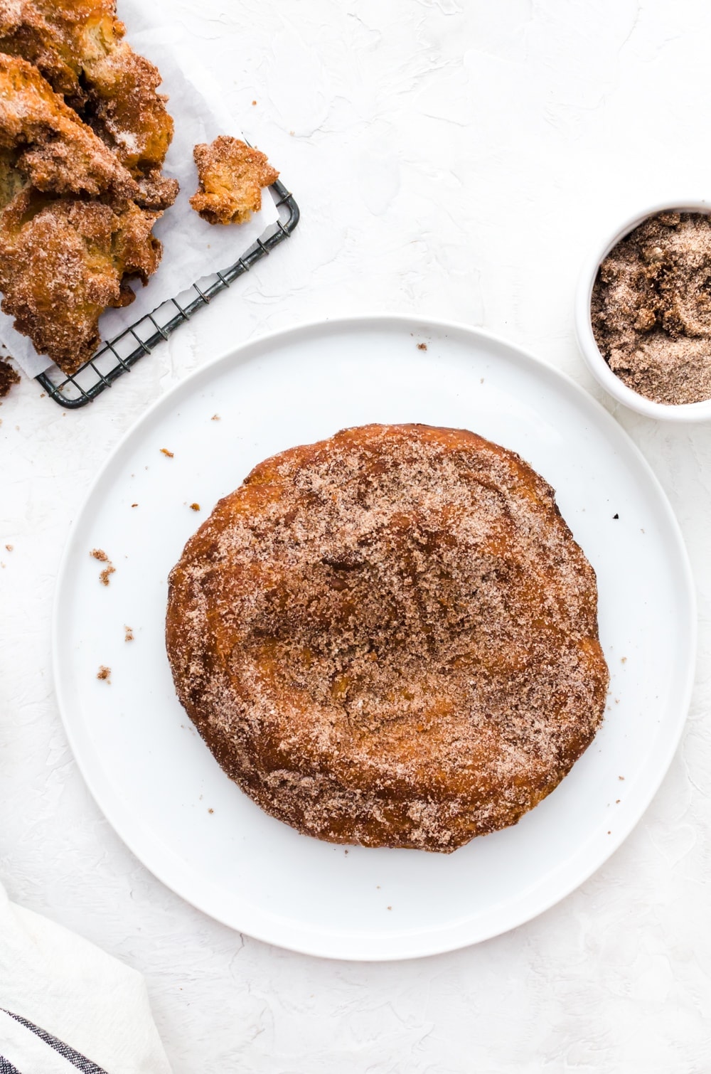 giant donut on a white plate