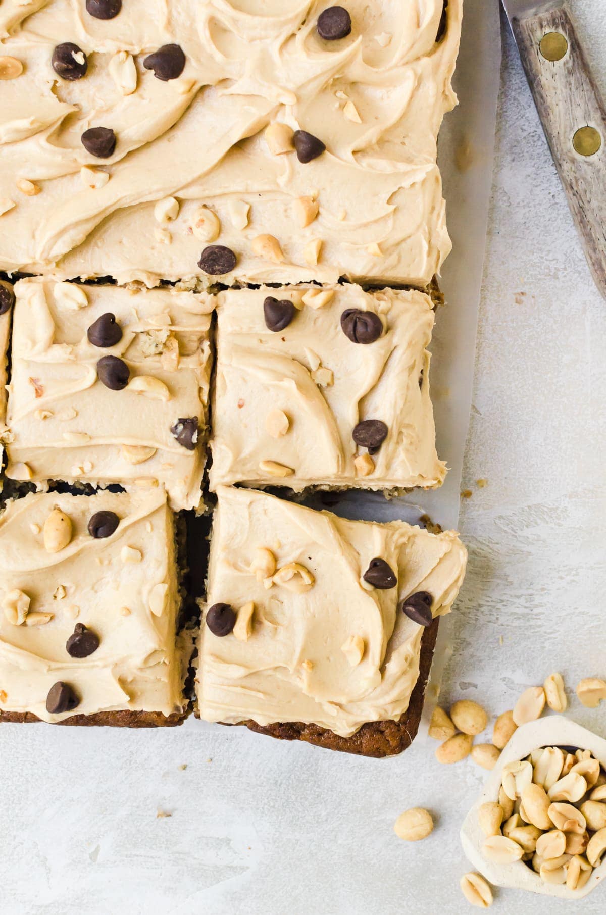 sliced banana sheet cake with peanut butter frosting