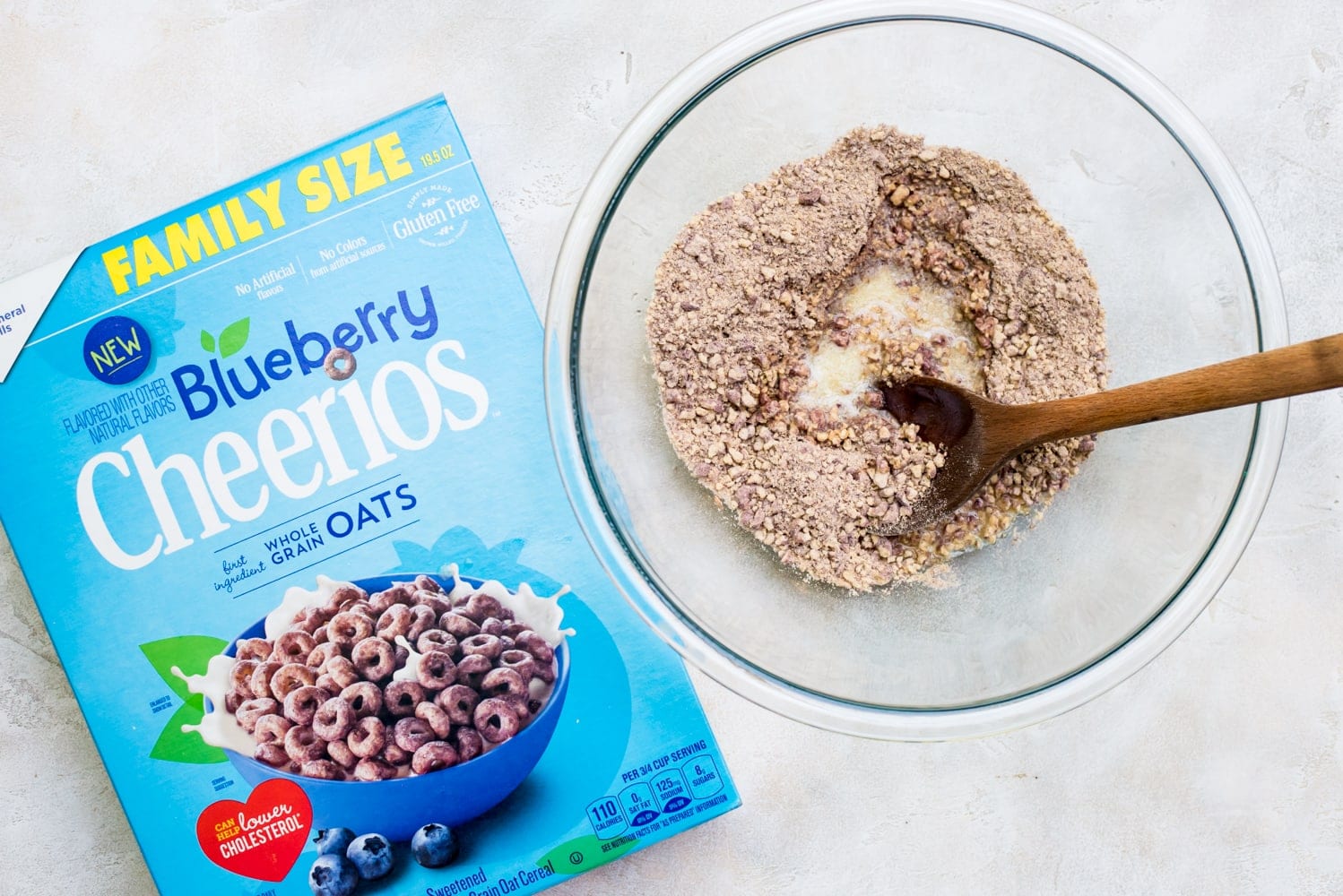 blueberry ice cream pie prep: cereal crumbs in bowl with melted butter