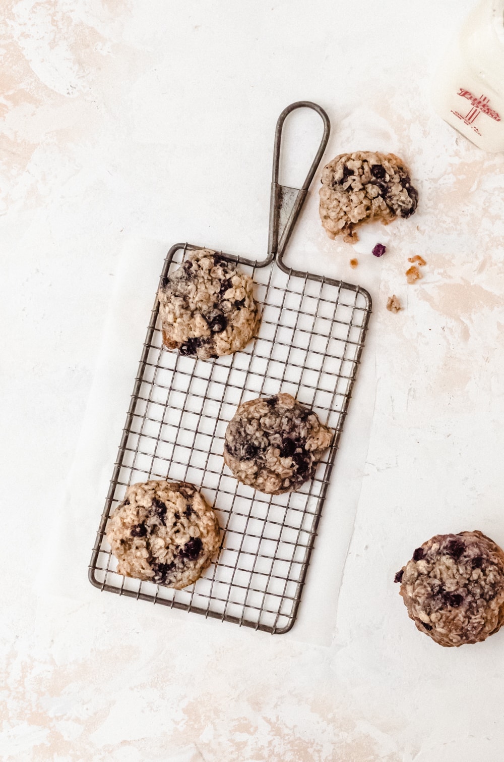overhead blueberry oatmeal cookies on wire rack
