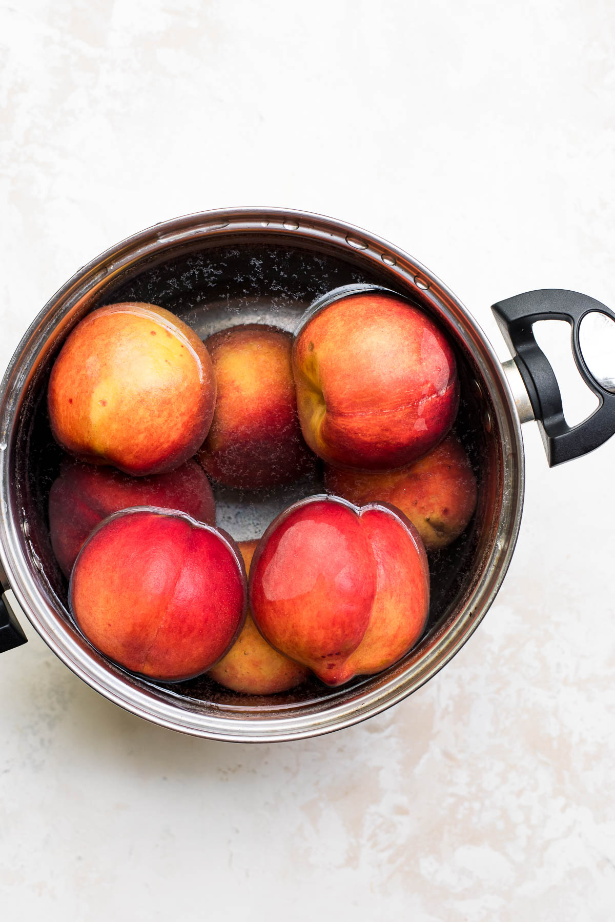 blanching peaches in boiling water