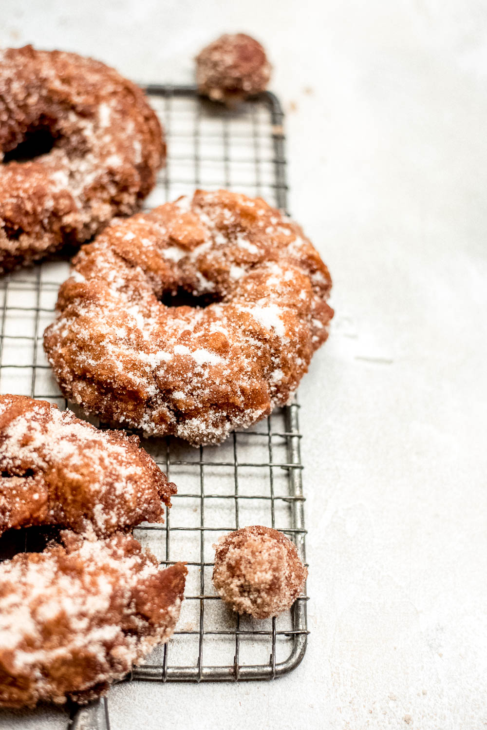 apple cider donuts close up on wire rack