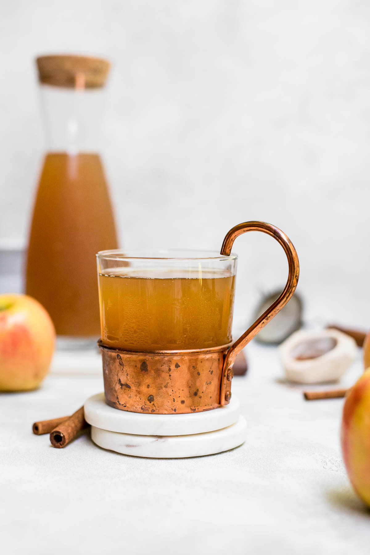 homemade  cider in glass and copper mug