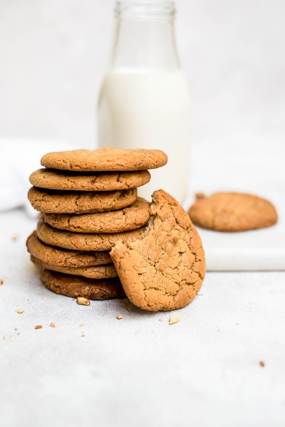 cookies stacked with bite eaten from one cookie