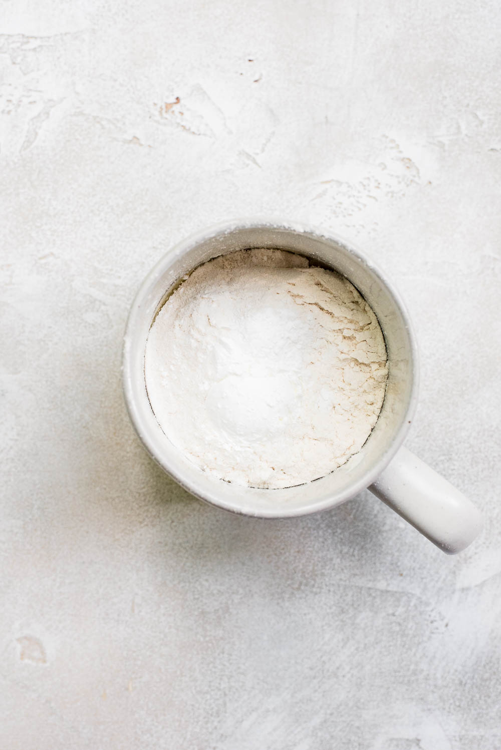 vanilla mug cake prep dry ingredients in mug