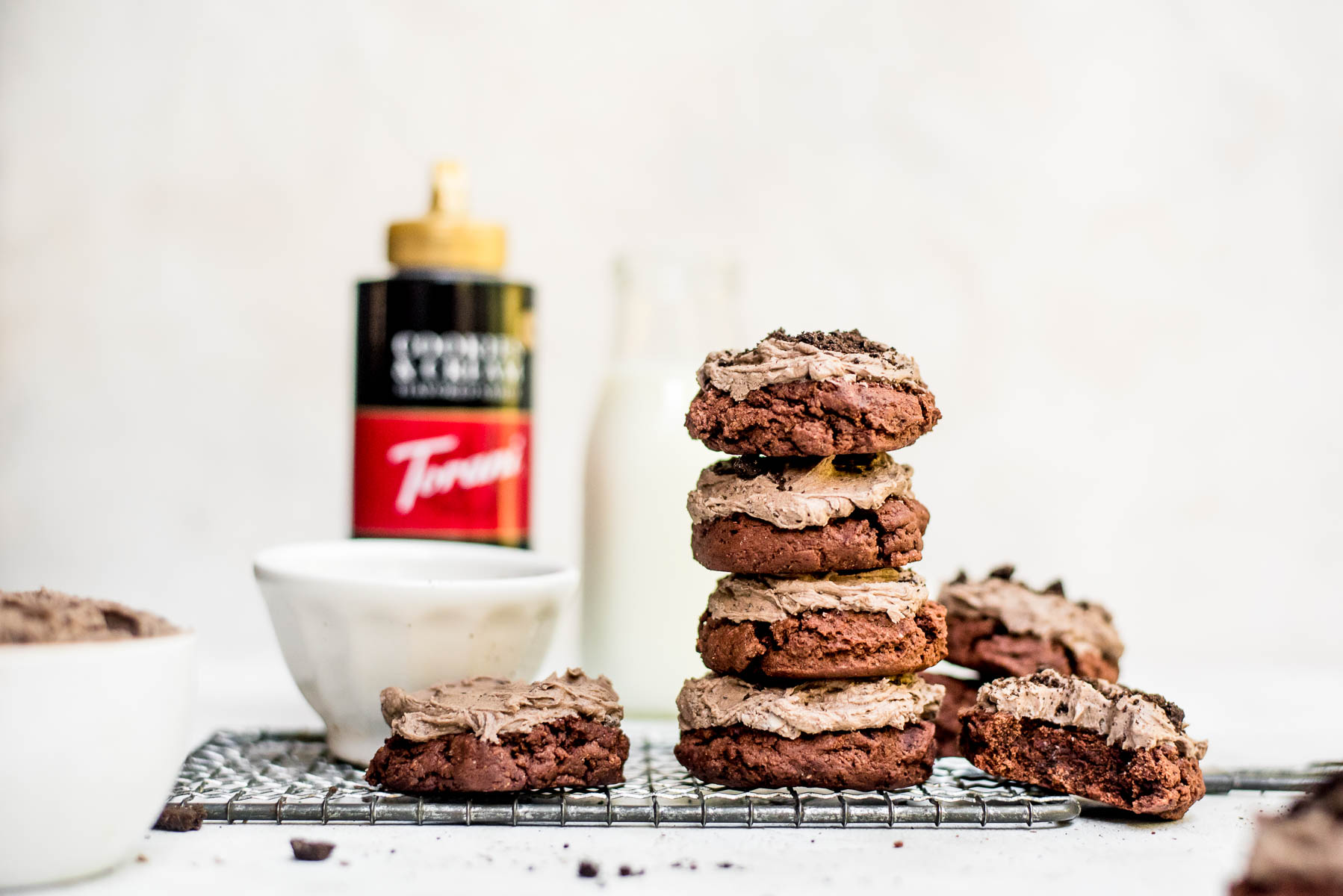 wide view of cookies on counter with ingredients