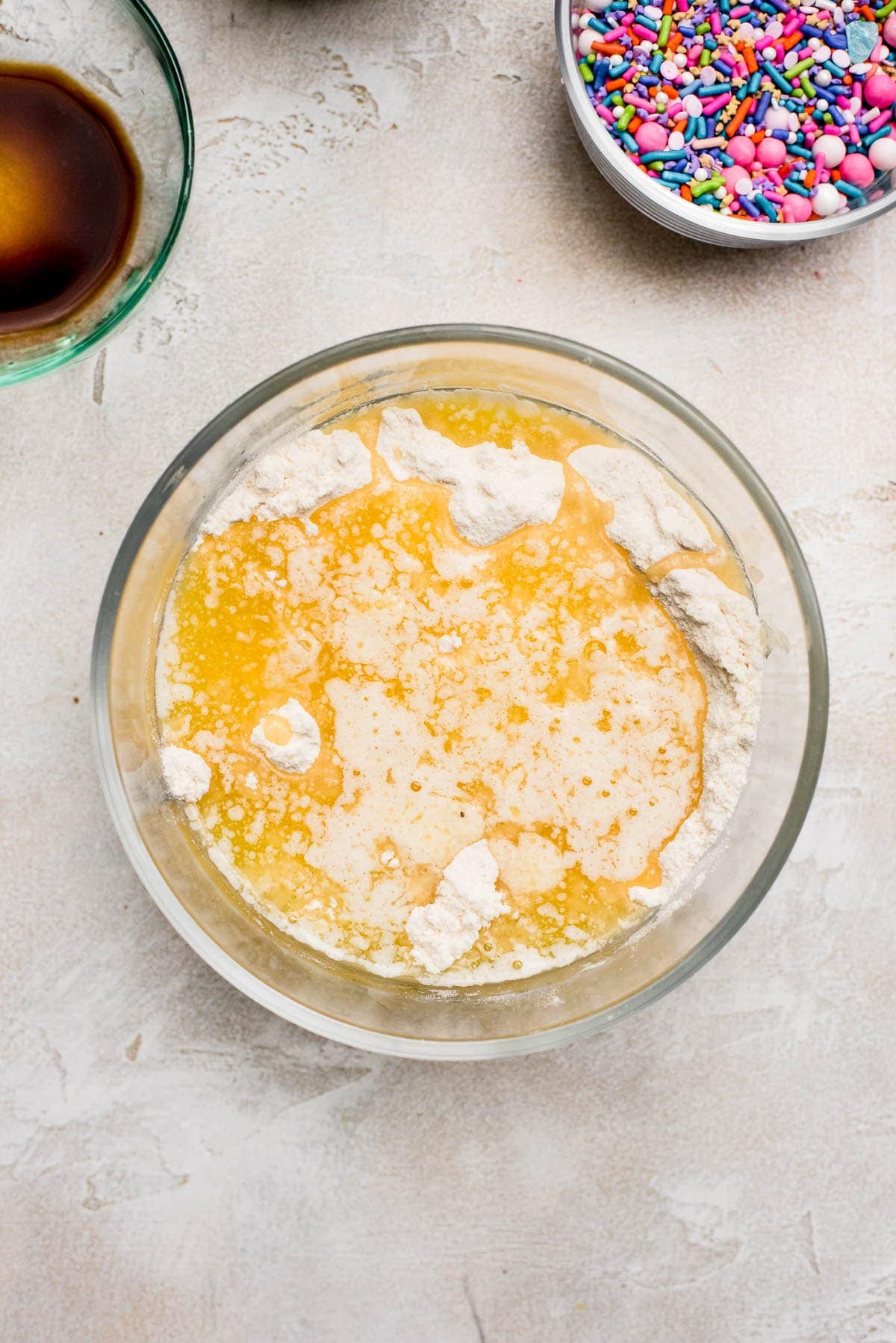 showing cookie dough being mixed in bowl