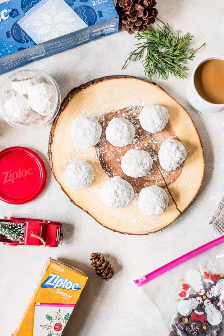 snowball cookies on wood board