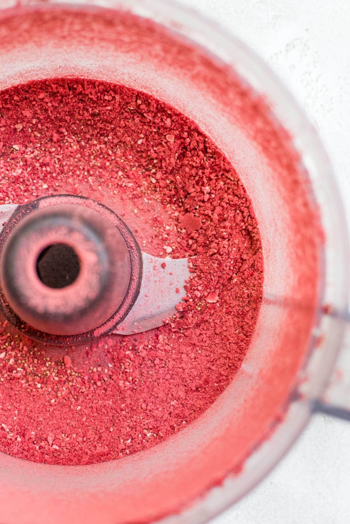 freeze dried strawberries being turned into powder