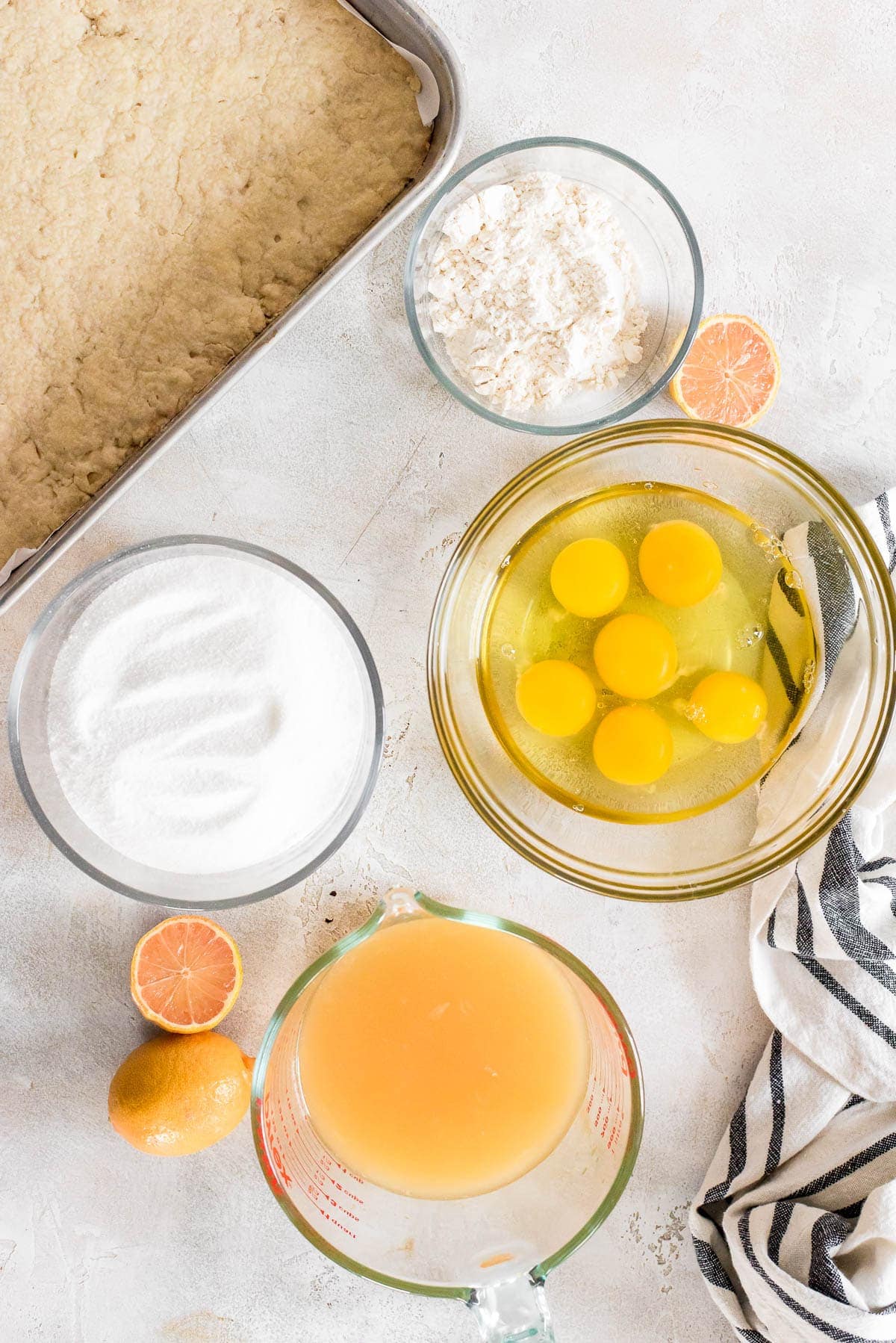 ingredients to make lemon bars in bowls