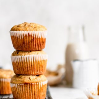 muffins stacked on one another on wire rack