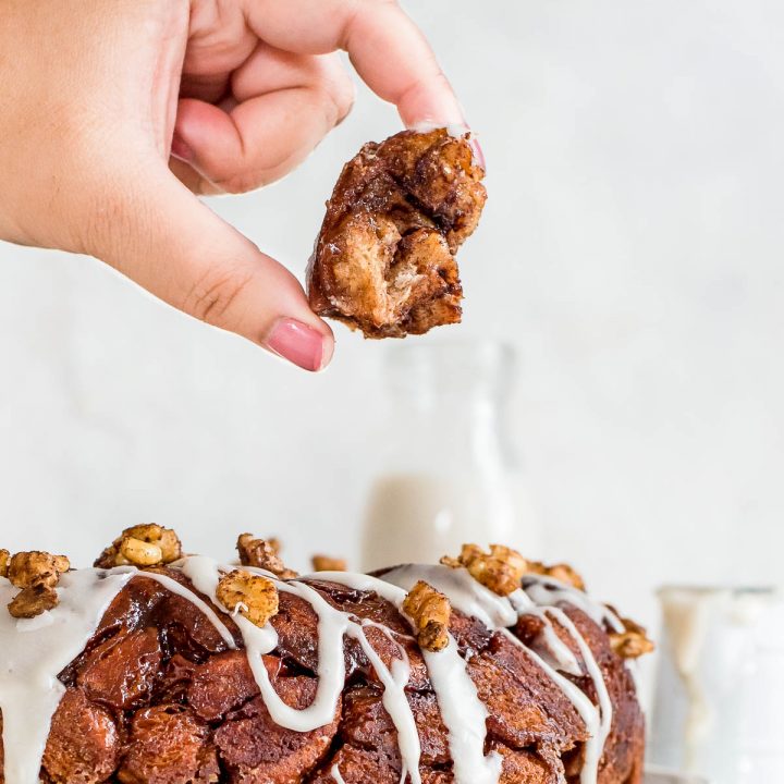 hand holding up piece of monkey bread