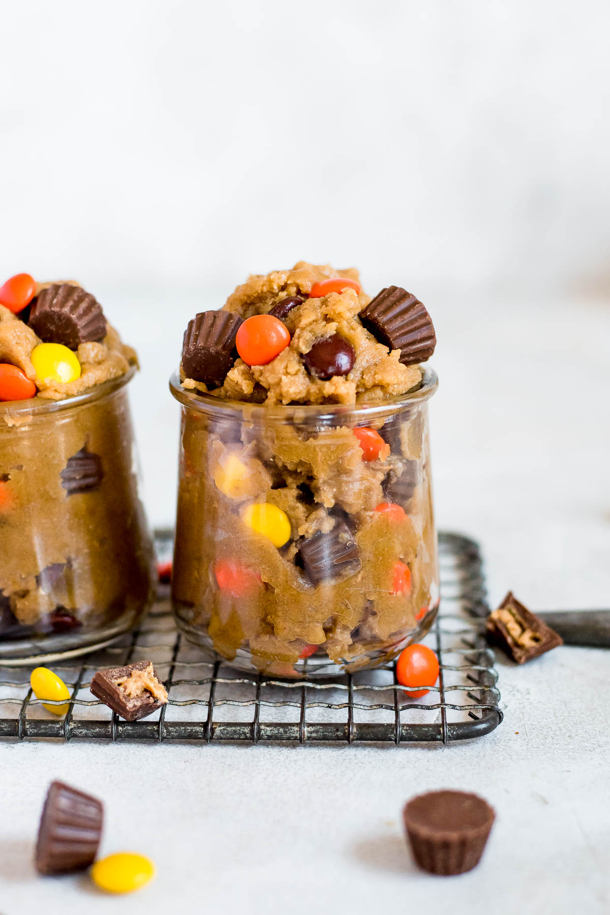 cookie dough in small glass jar on wire rack