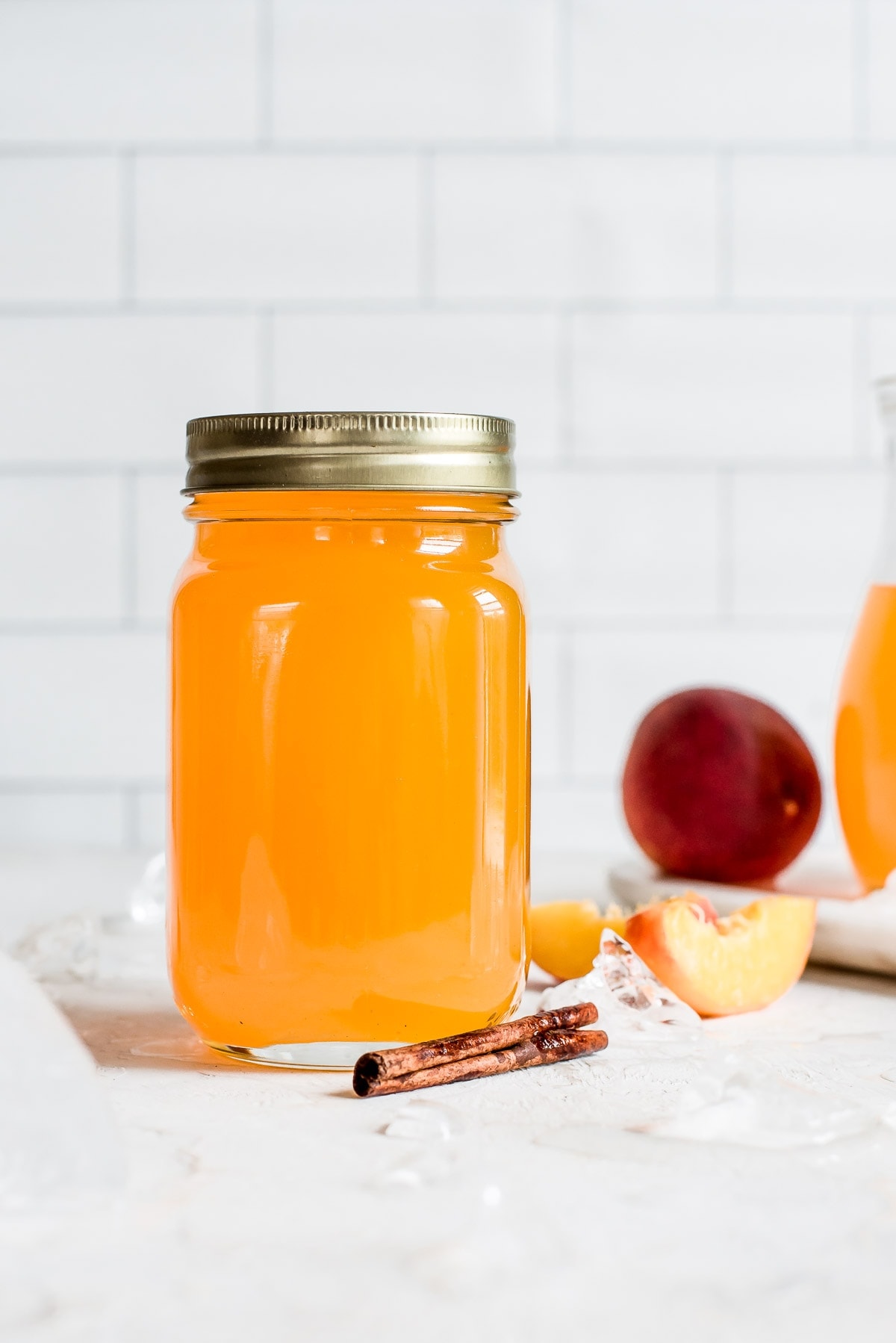 peach moonshine in mason jar