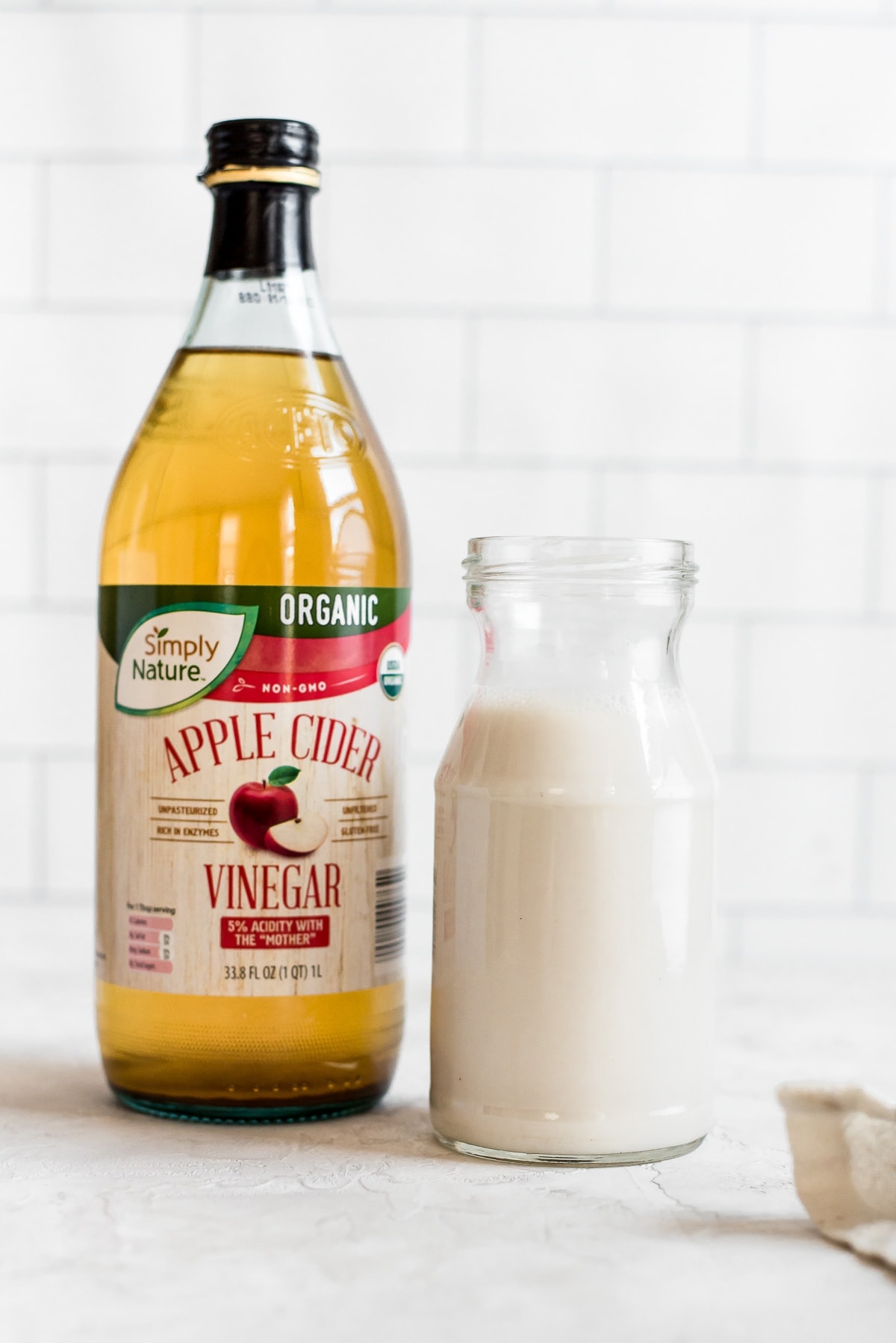 bottle of vinegar next to milk