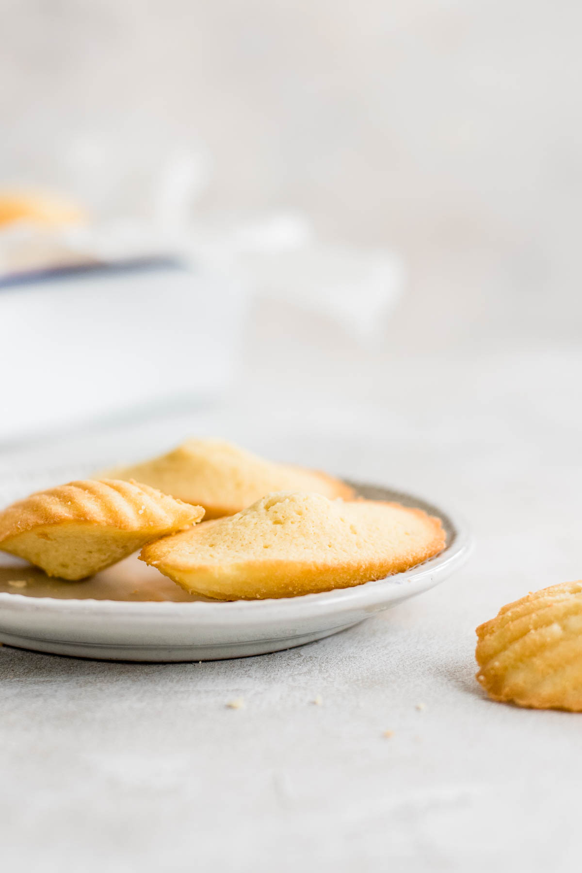 close up of madeleines on a plate