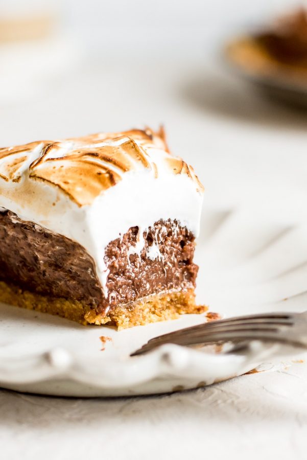 close up of smores pie with bite missing showing off filling