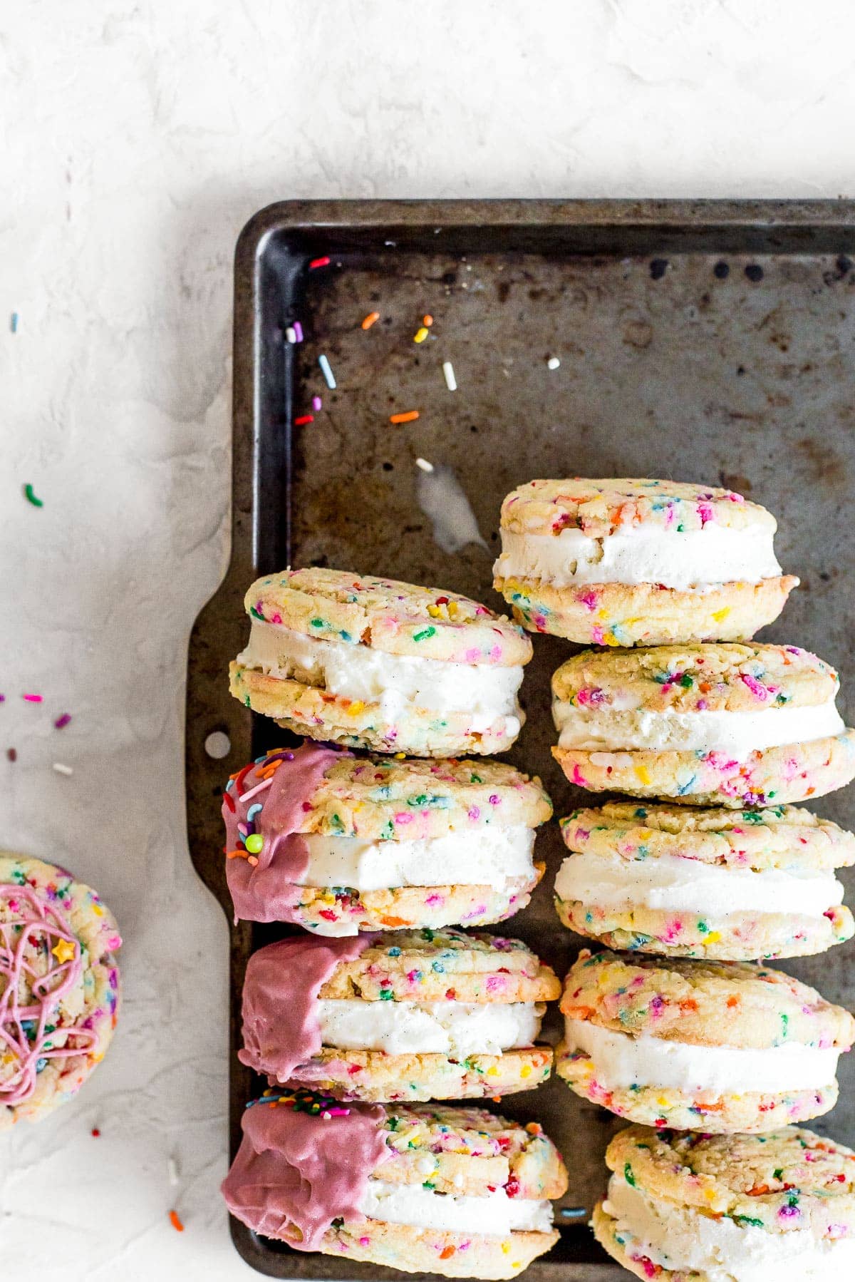 ice cream sandwiches stacked on baking sheet