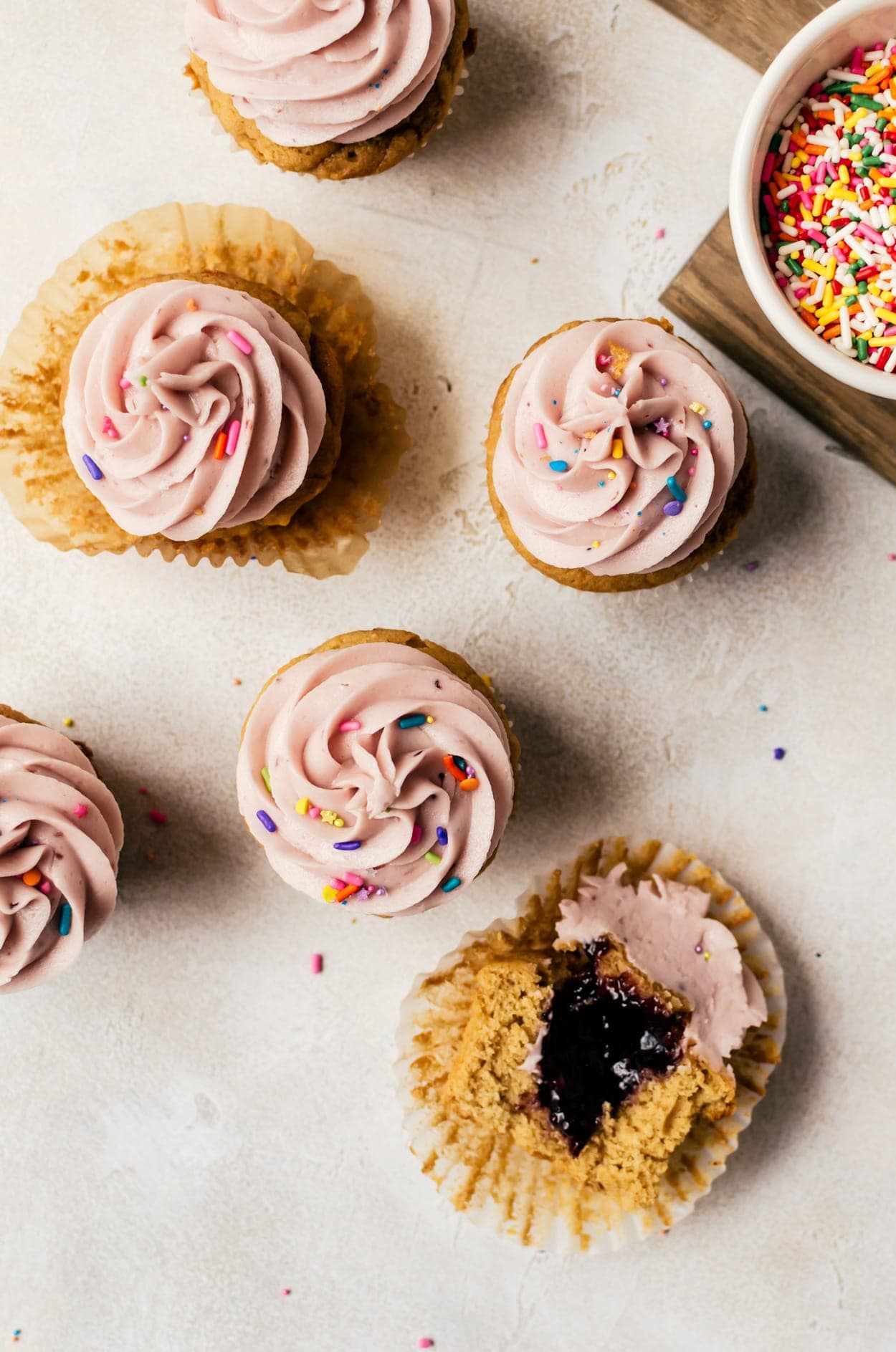 overhead pb & j cupcakes on table showing inside