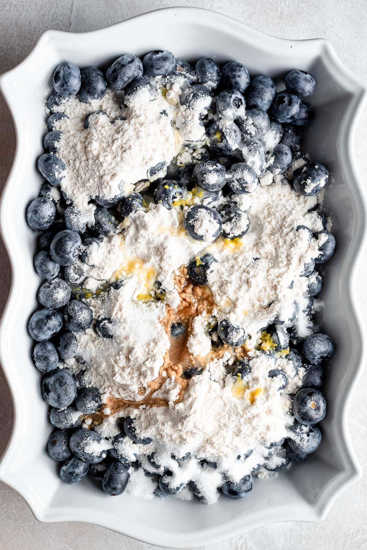 blueberries coated in sugar, cornstarch, vanilla, and salt