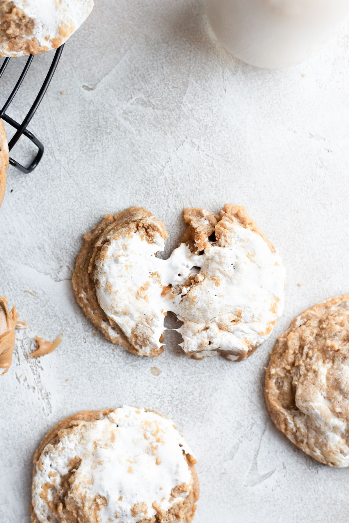 cookie being pulled apart showing gooey marshmallow