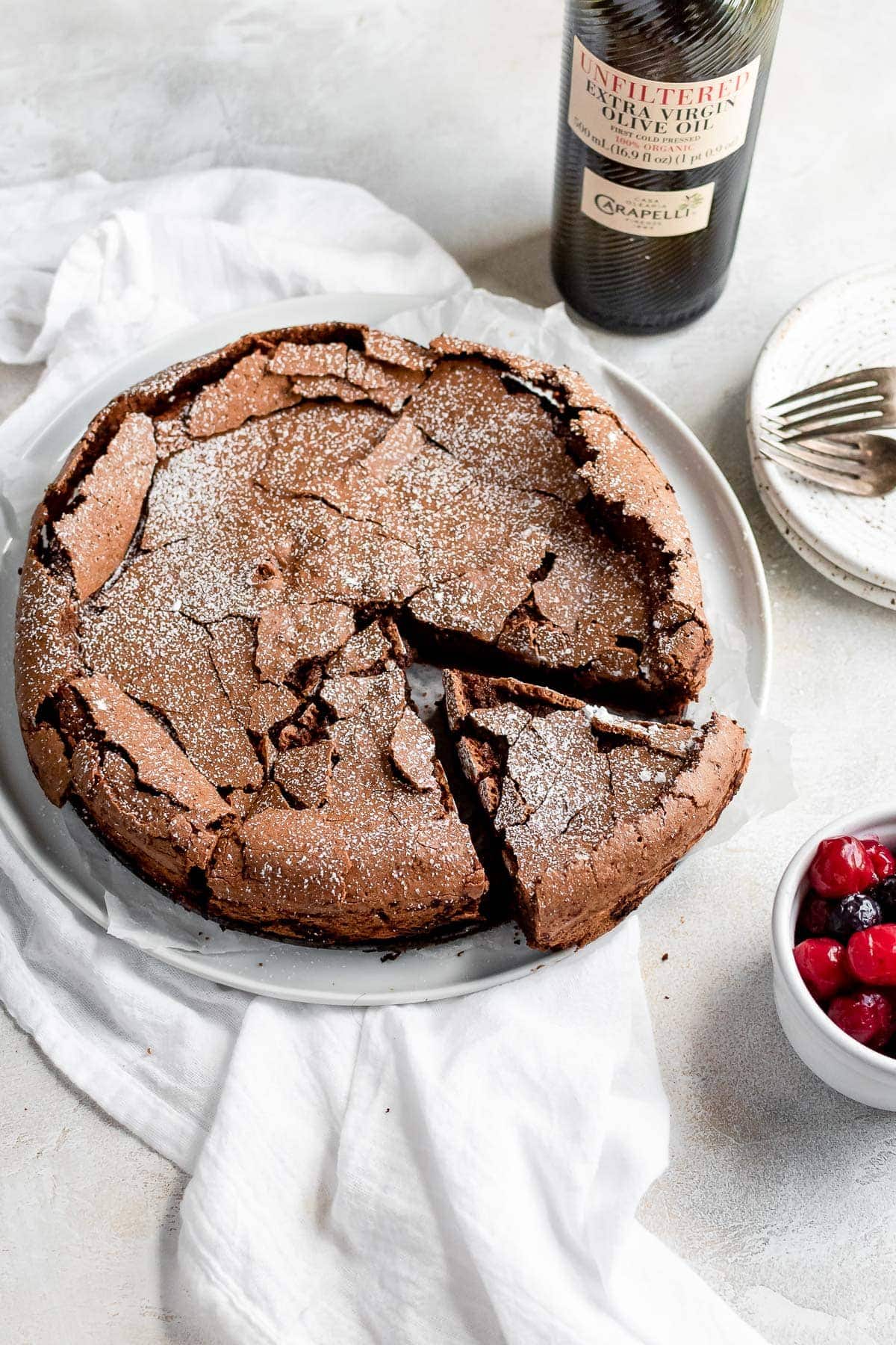 fallen chocolate cake with slices being pulled out