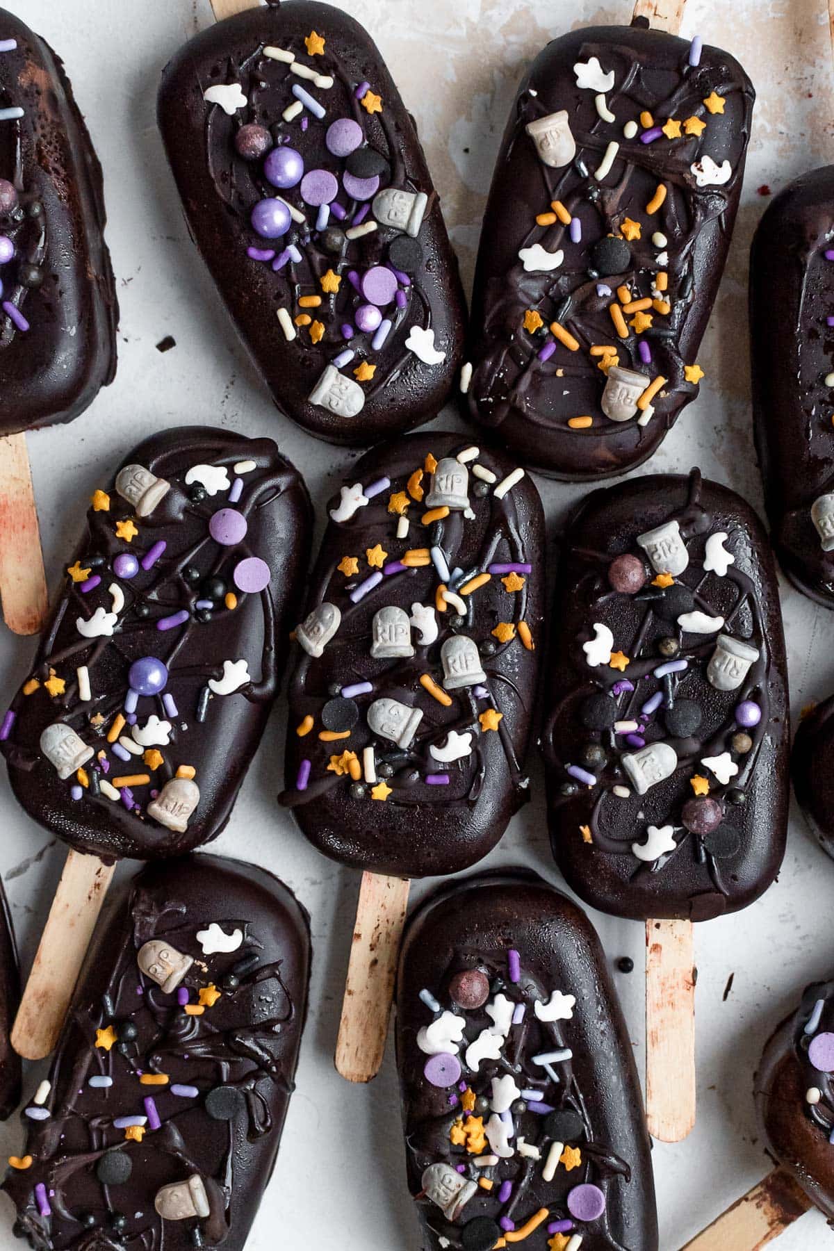 dark chocolate cake pops topped with Halloween sprinkles