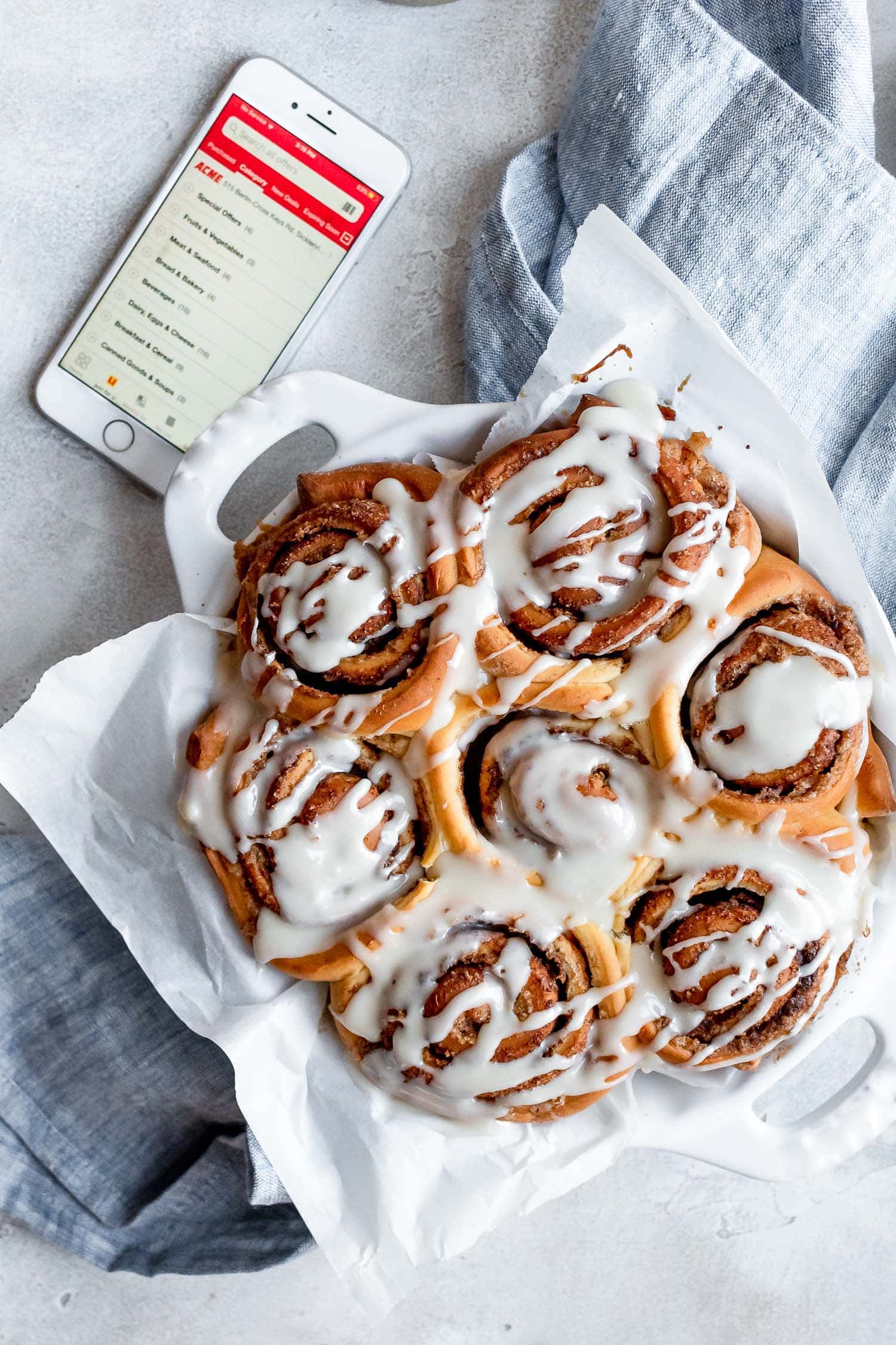 freshly baked cinnamon rolls topped with glaze
