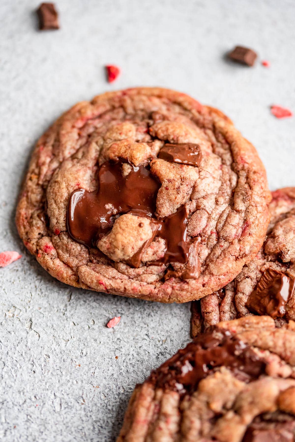 close up of cookie showing pool of melted chocolate