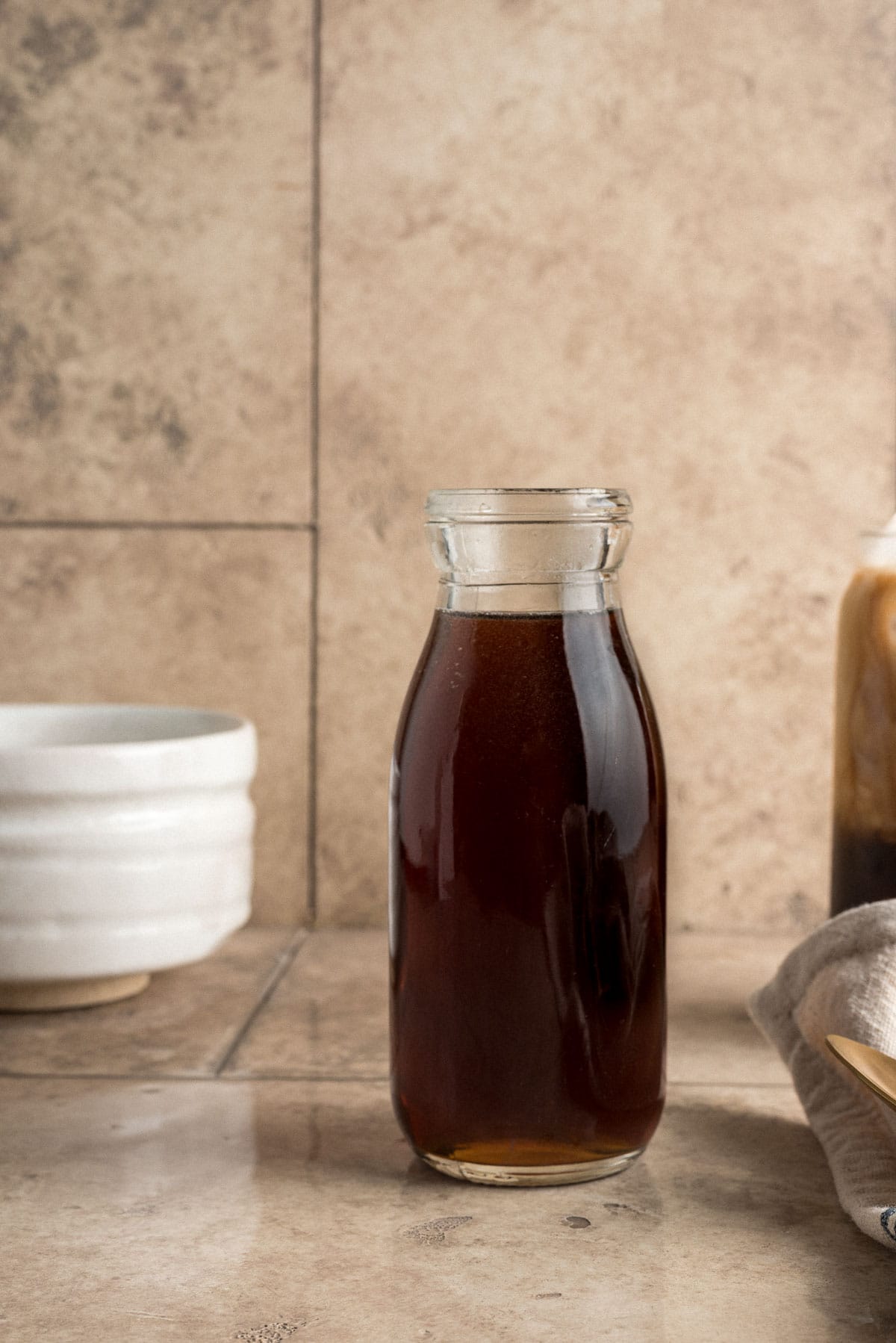 container filled with simple syrup made with brown sugar