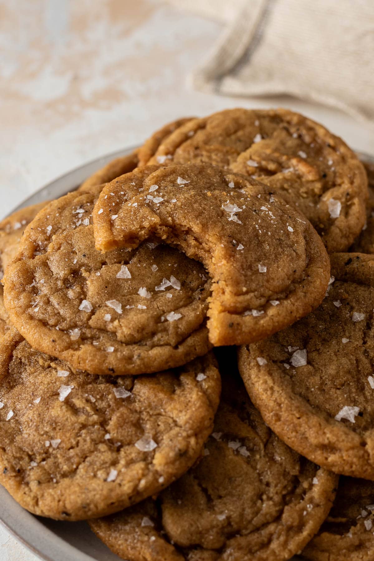 stacked chocolate chipless cookies on plate close up