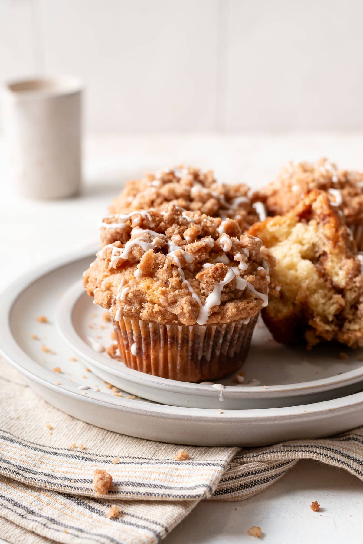 muffins drizzled in icing on plate