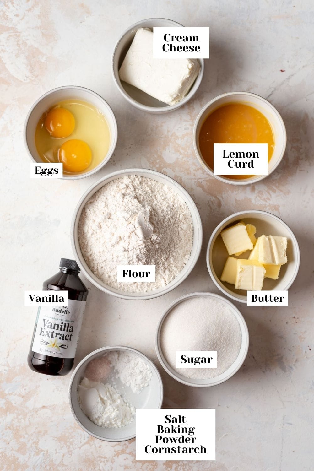 labeled ingredients for lemon bar cookies in bowls