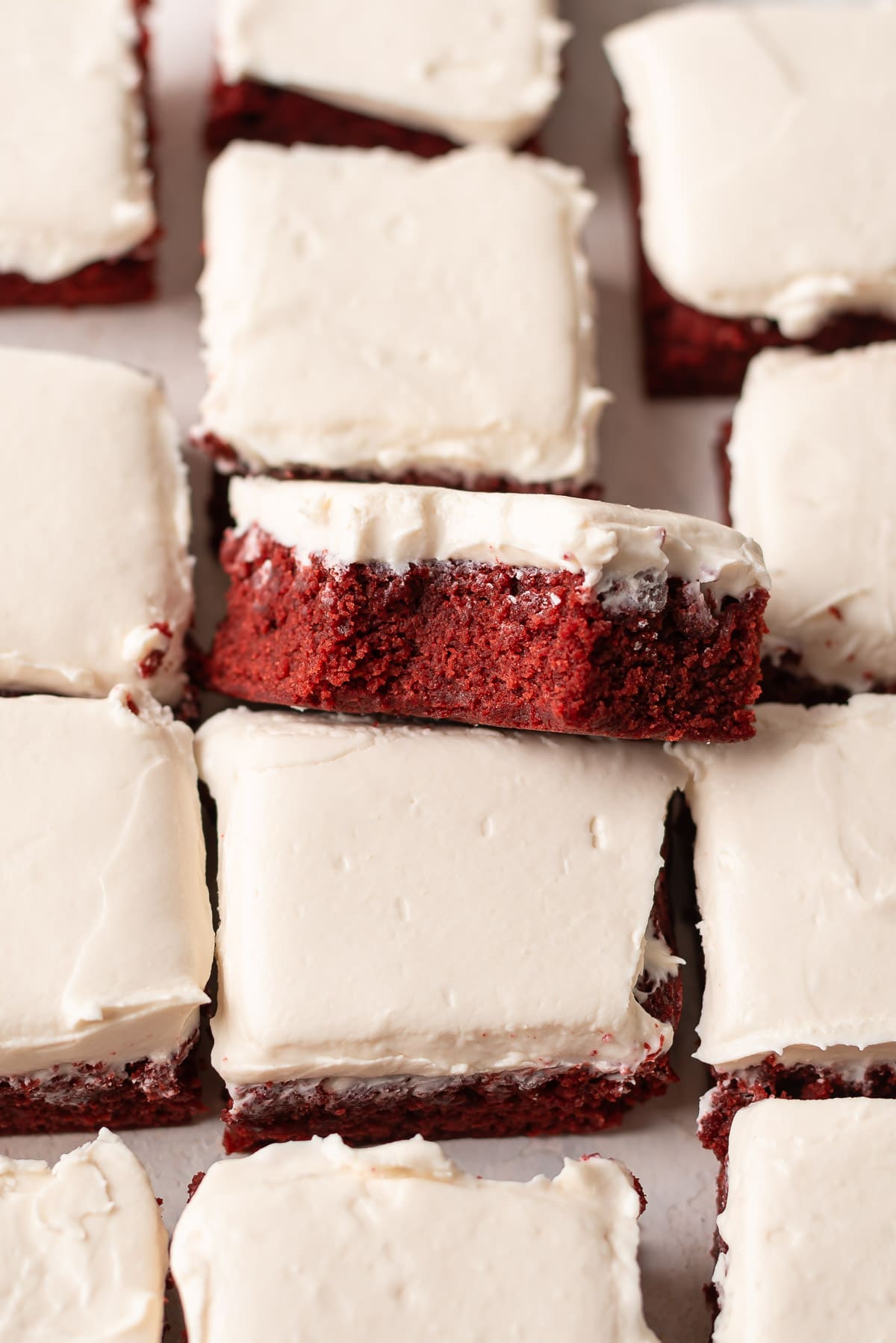 overhead sliced brownies together showing layers of brownie and frosting