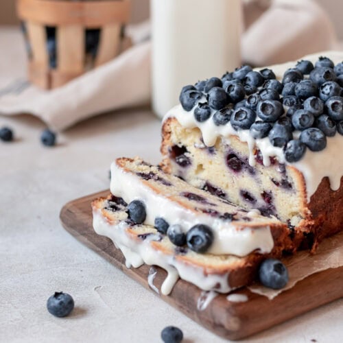 sliced pound cake on wood board